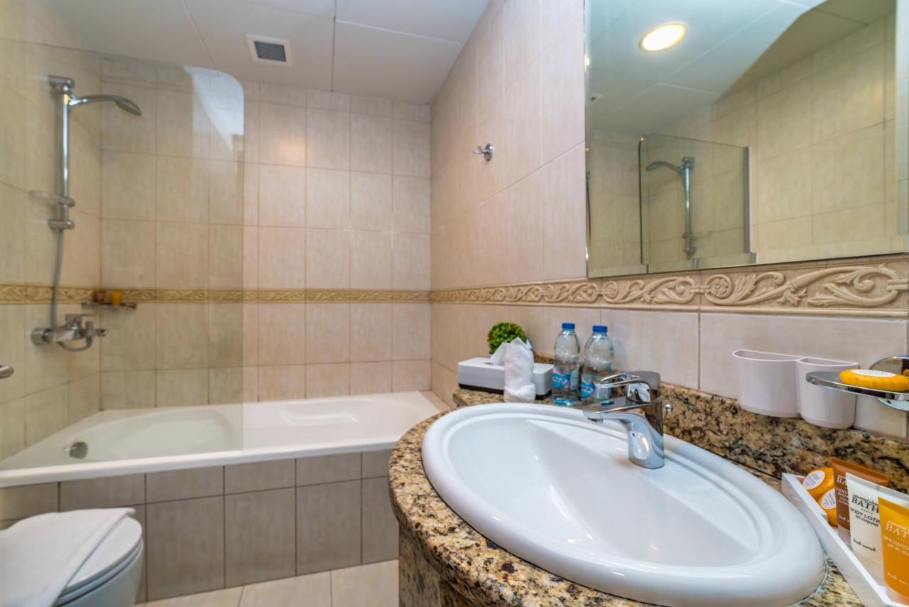 Yanjoon Holiday Homes - Princess Tower Apartments Дубай Стая снимка